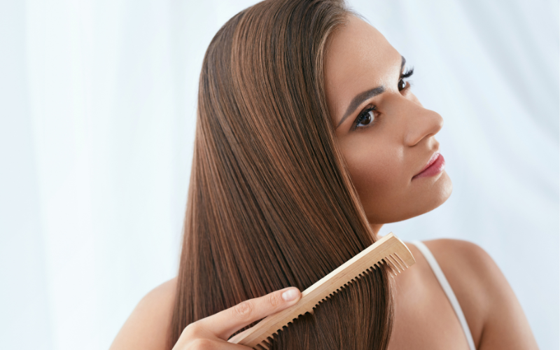 girl combing her hair