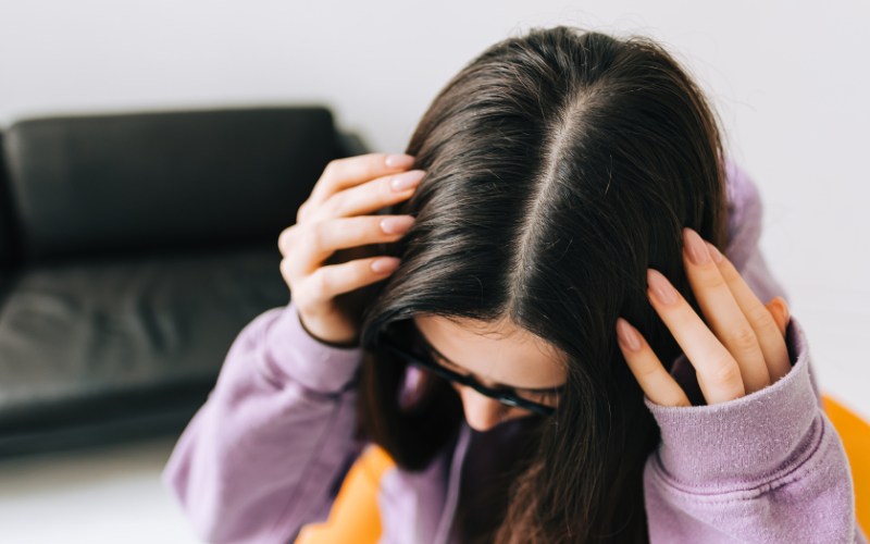 girl showing Stronger Roots in hair