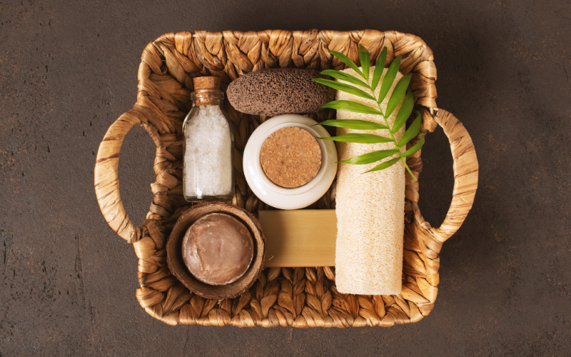 skincare products in basket - towel, salt, soap, cream