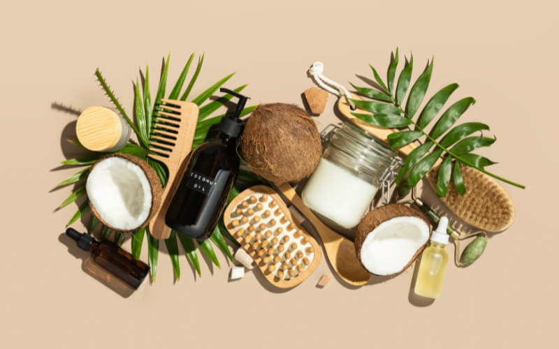 skincare products like coconut, combs, cream, oil, serum