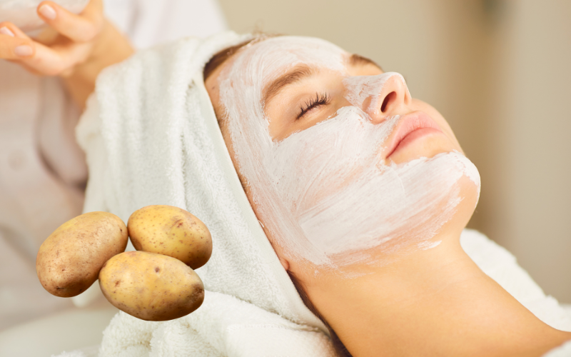 woman with cream on face, potato on left