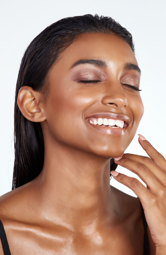 girl smiling with eyes closed