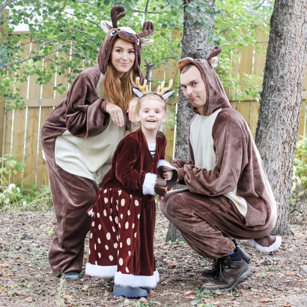 mother father daughter in Deer costumes 