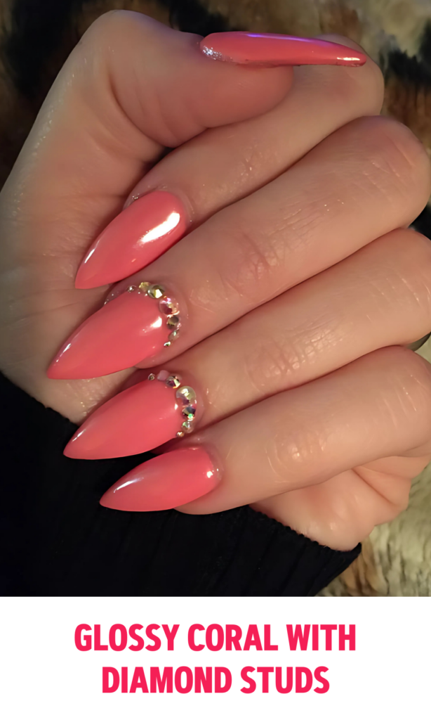 Glossy Coral Nails with Diamond Studs