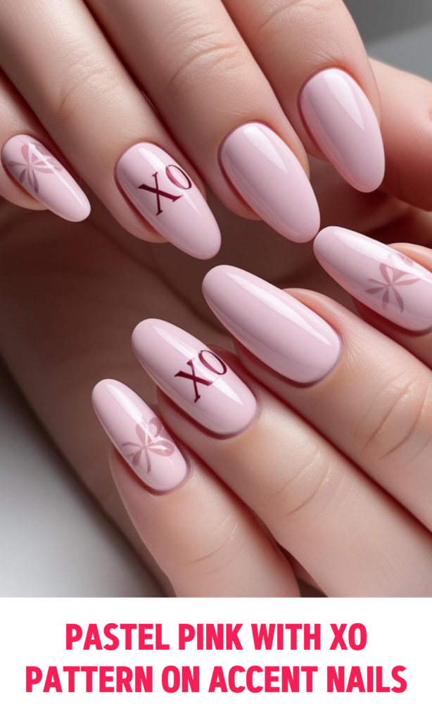 Pastel Pink Nails with XO Pattern on Accent Nails