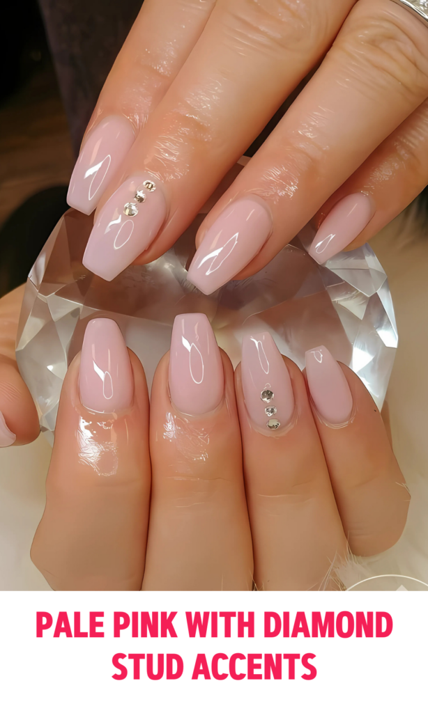 Pale Pink Nails with Diamond Stud Accents